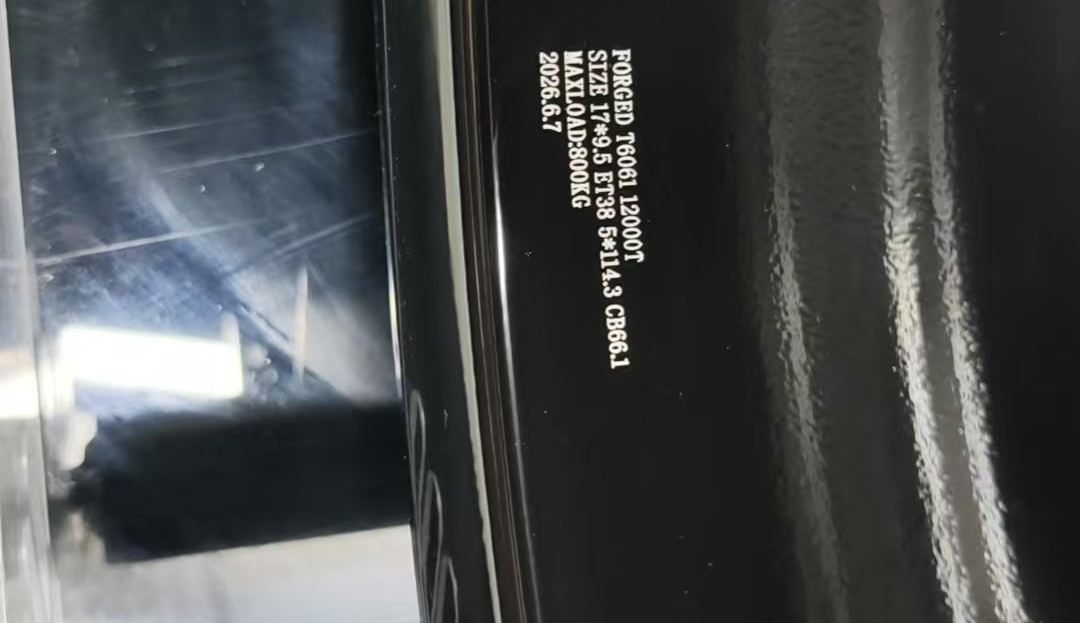 LSW black forged wheels with laser-engraved specifications, load and production traceability information on the inside