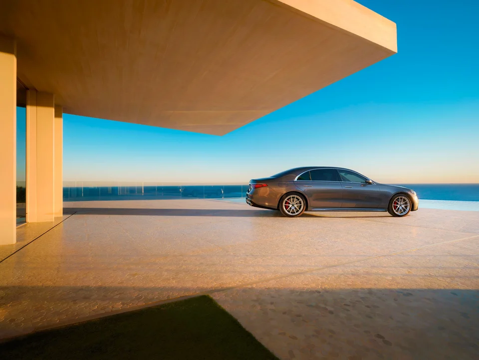 Mercedes-Benz S-Class with silver LSW forged wheels on a coastal terrace
